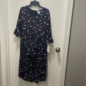 Brand new high low dress/shorts color black with flowers size 14